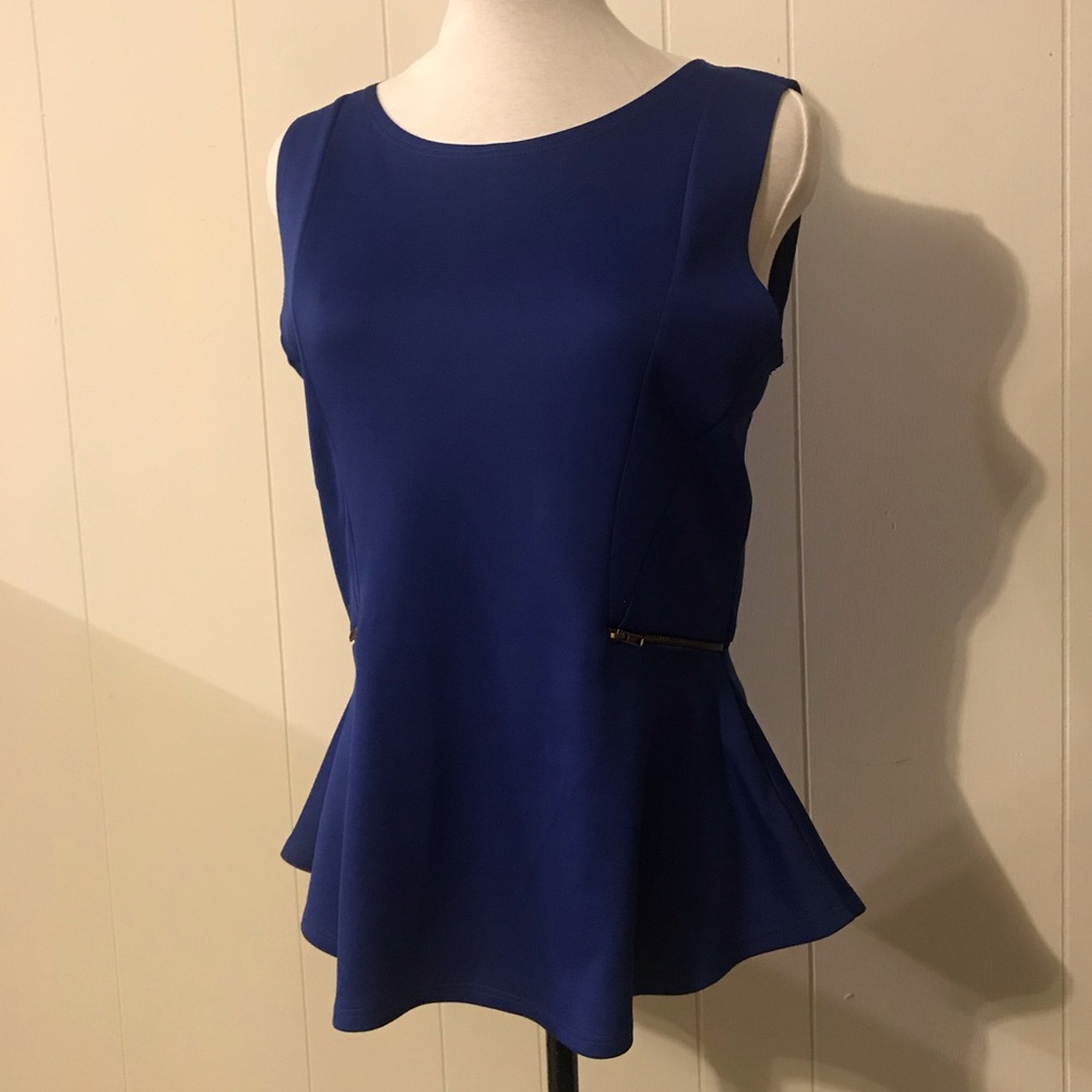 Beautiful peplum blue top